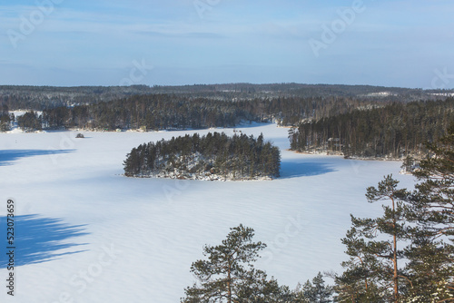 Repovesi National Park, aerial winter view, landscape view of a finnish park, southern Finland, Kouvola and Mantyharju, region of Kymenlaakso, with a group of tourists and wooden infrastructure photo