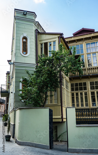 Traditional inner yard with carving wooden baclonies photo