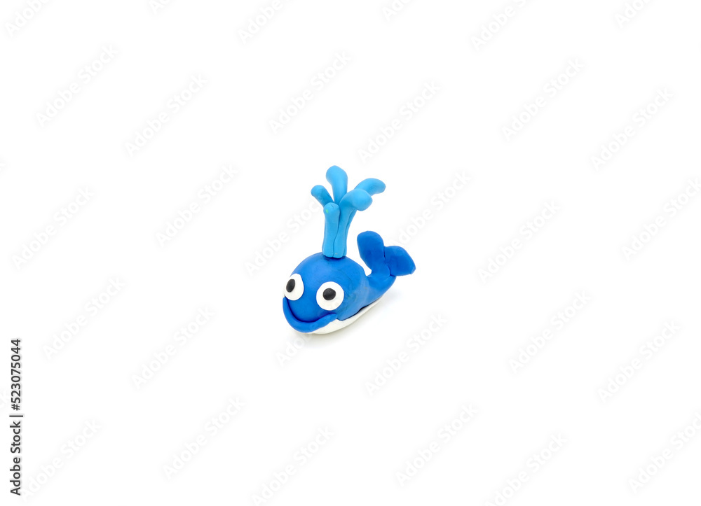 blue whale with a fountain made of plasticine blue whale with a fountain made of plasticine