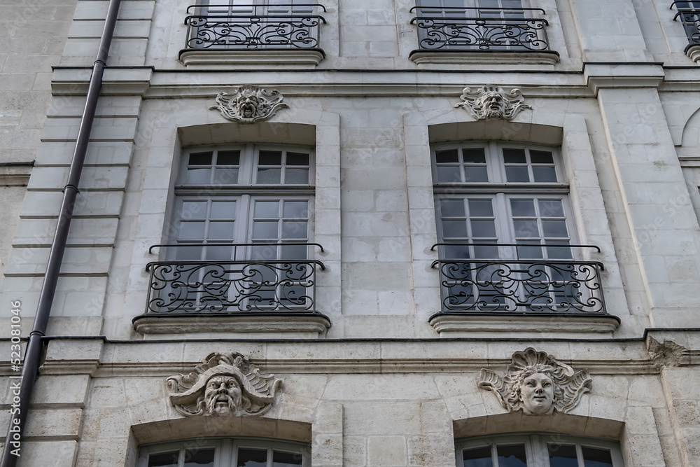 Architectural fragments of beautiful facades on Nantes Quai Turenne. Nantes, Loire Atlantique, France.