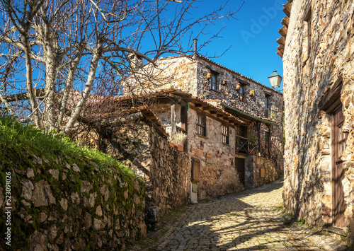 Street view of the village of Casal de São Simão in Portugal, with beautiful stone houses. photo