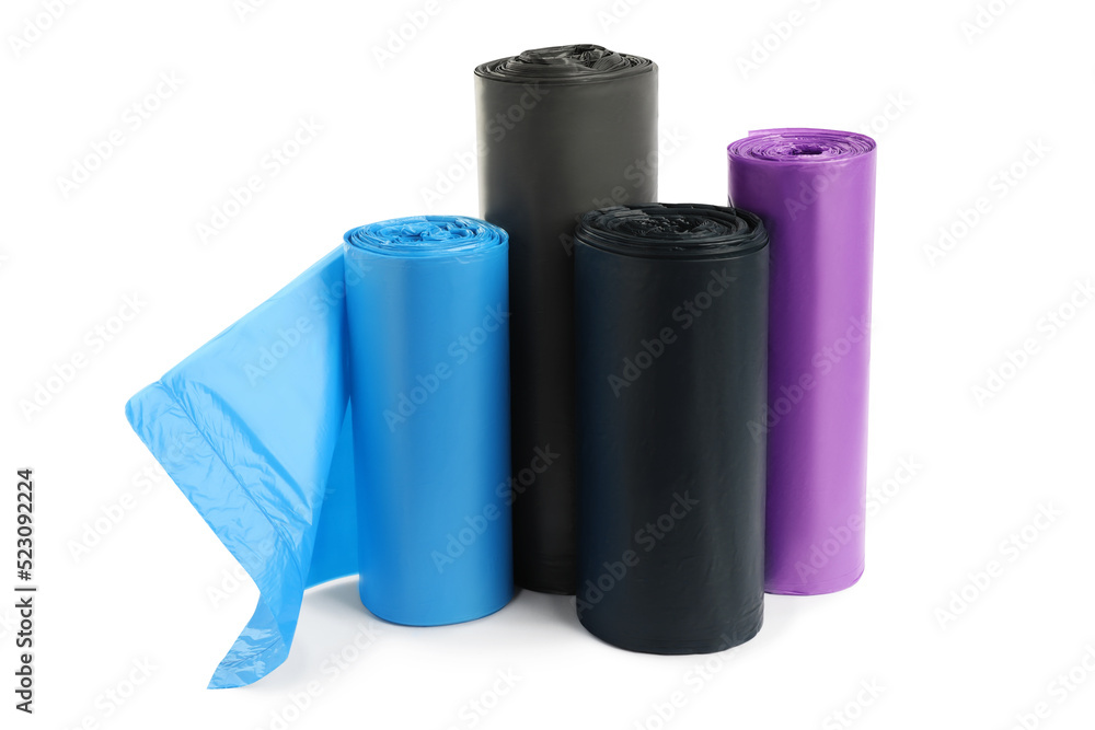 Rolls of different garbage bags on white background. Cleaning supplies Rolls of different garbage bags on white background. Cleaning supplies