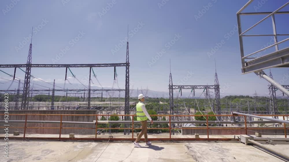 Switchyard. Energy Production Facility.
Power plant with high voltage transformer and energy flow.
Switchyard. Energy Production Facility.
Power plant with high voltage transformer and energy flow.