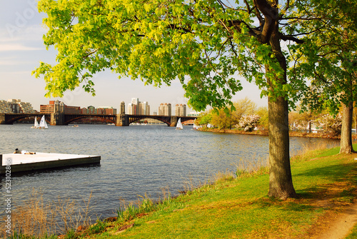 A dock, from community boating sits in the Charles River and offers a view of the Longfellow Bridge in Boston photo