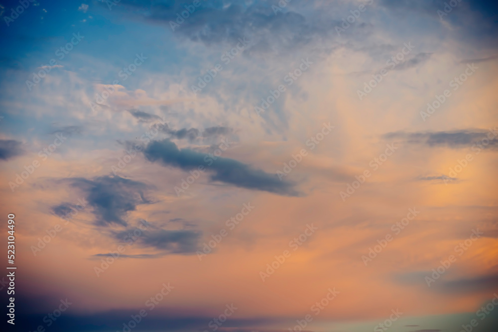 Natural background with sky and clouds at sunset