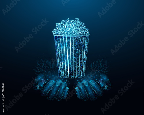 Two human hands are holds pop corn. Wireframe glowing low poly pop corn. Design on dark blue background. Abstract futuristic vector illustration.