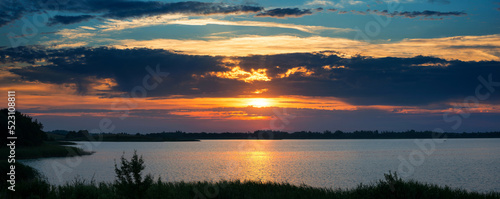 Serene landscape with a lake lake in the evening © v_blinov