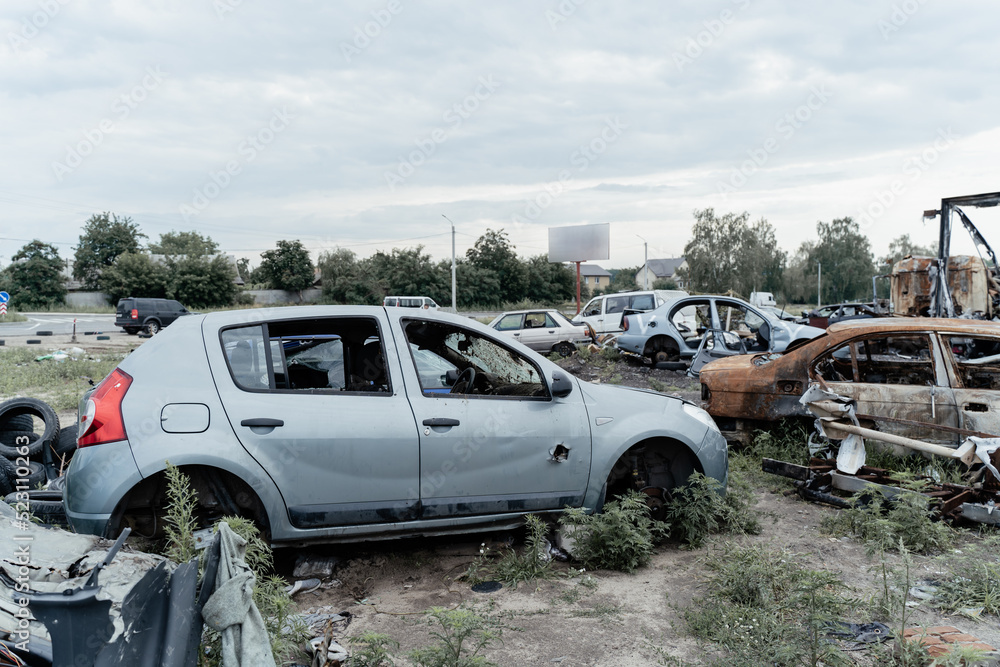 15.07.2022, Bucha Car graveyard. Shot cars of civilians. russia's war against Ukraine 15.07.2022, Bucha Car graveyard. Shot cars of civilians. russia's war against Ukraine