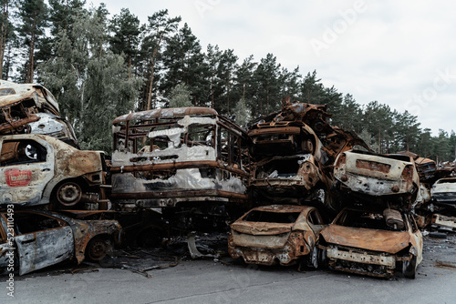 15.07.2022, Irpin Car graveyard. Cars of civilians were shot. The remains of the bus war of Russia against Ukraine