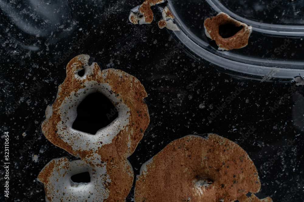 15.07.2022 On broken, burned cars, a closeup shot of areas and holes