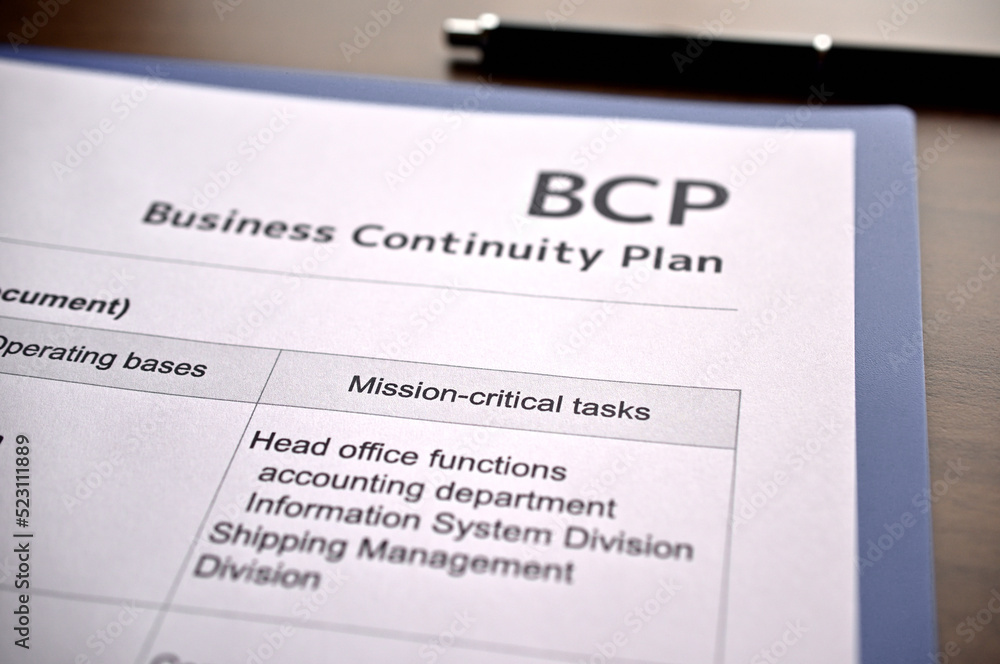 There is dummy documents that created for the photo shoot on the desk about Business Continuity Plan. There is dummy documents that created for the photo shoot on the desk about Business Continuity Plan.