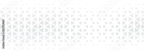 white banner with triangle halftone shapes