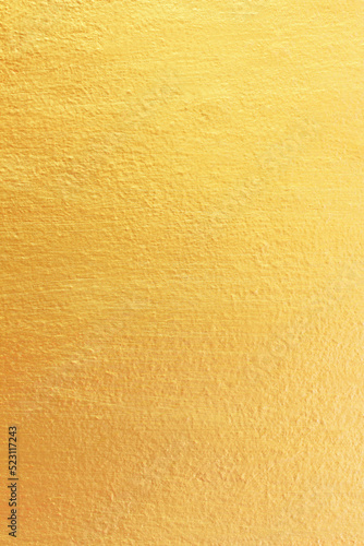 Gold paint on cement wall texture