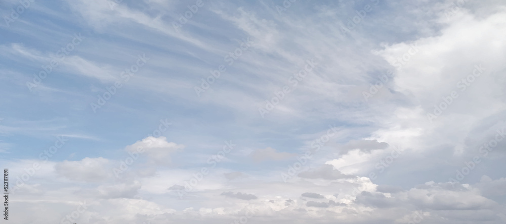 Bright blue sky with white clouds for background or wallpapers. The beauty of tropical nature for graphic design. blue sky background with white clouds. 