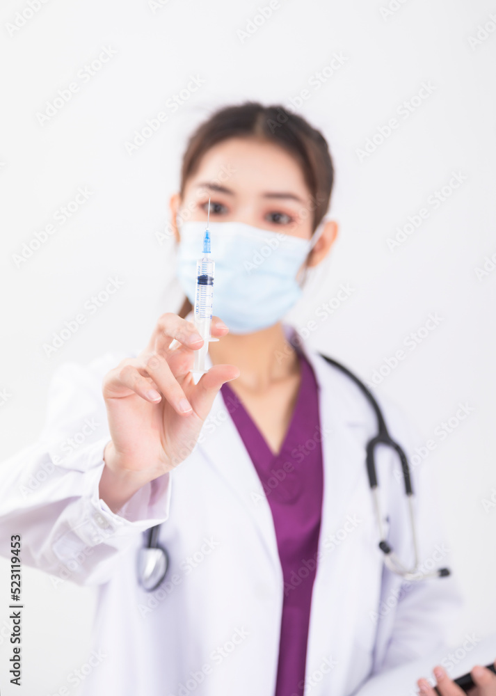 A woman doctor in a white coat A woman doctor in a white coat