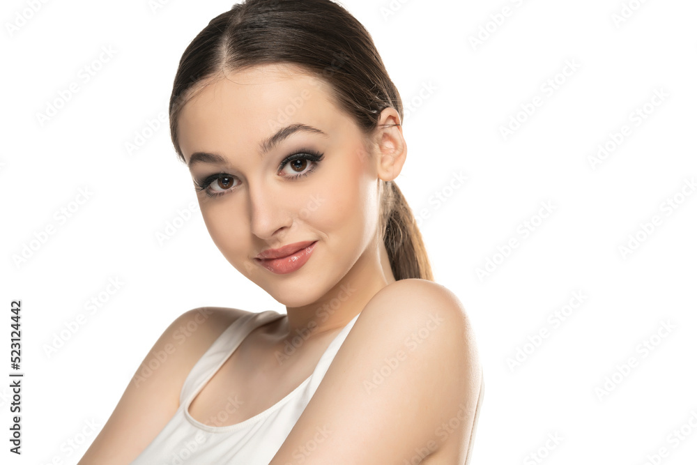 beautiful young smiling women with makeup on a white background. beautiful young smiling women with makeup on a white background.