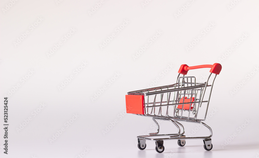 Empty small shopping cart on white background and copy space Empty small shopping cart on white background and copy space