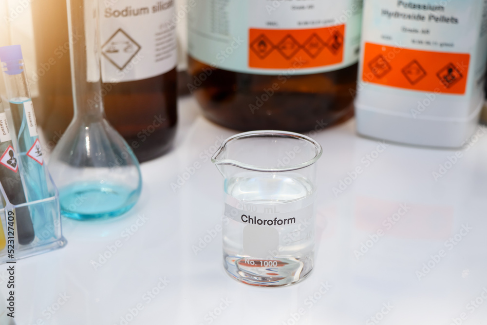 Chloroform in glass, chemical in the laboratory Chloroform in glass, chemical in the laboratory