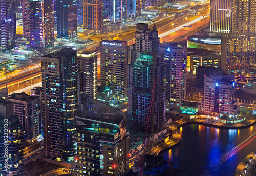 Dubai marina towers closeup view with waterfront bay