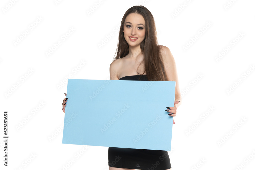 portrait of a young smiling woman on a white background, advertise some product. portrait of a young smiling woman on a white background, advertise some product.