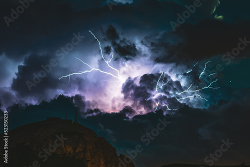 Huge lightning bolt during nightly thunderstorm in the Dolomites