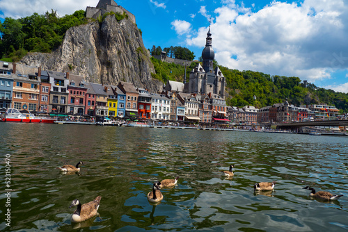 Dinant, Belgium - Female tourist visiting the beautiful village of Dinant during summer photo