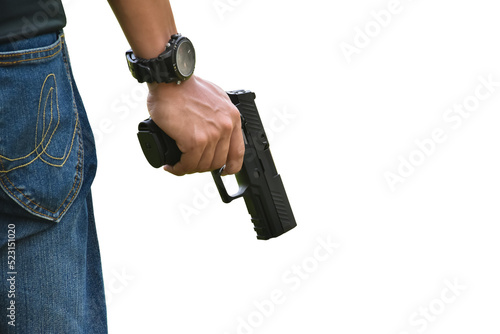 Isolated automatic 9mm pistol gun holding in right hand with clipping paths. concept for using pistol to protect properties and humans in crisis situations around the world. photo