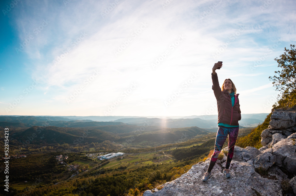 Fototapeta premium The girl takes a selfie