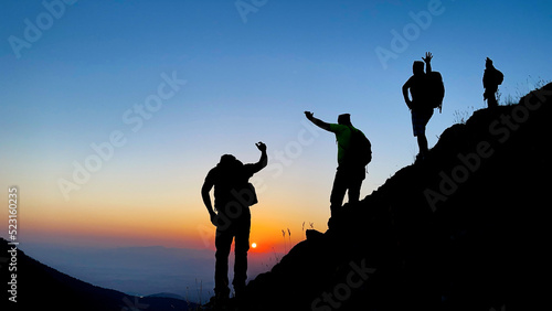 enthusiasm, success and harmonious movements of mountaineers at the summit