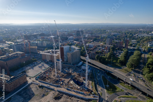 Fototapet Manchester City Centre Drone Aerial View Above Building Work Skyline Construction Blue Sky Summer Beetham Tower Deansgate Square 2022