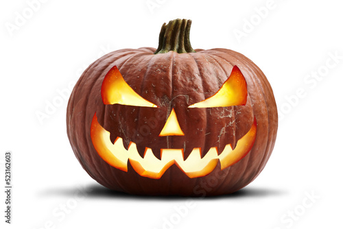 A single lit spooky halloween pumpkins, Jack O Lantern with evil face and eyes isolated against a transparent background. photo