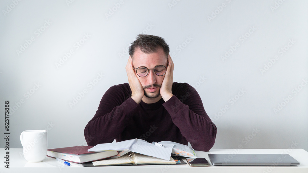 Routine and a lot of tasks at work - a male employee solves complex work tasks Routine and a lot of tasks at work - a male employee solves complex work tasks