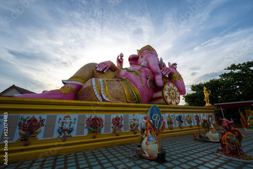 Wat Saman Rattanaram temple is a giant Reclining Ganesha which is said to be the biggest in in Chachoengsao, Thailand photo