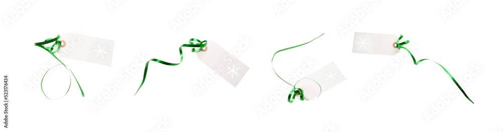 A collection of gift tags and label template with green ribbon attached to add to presents, Christmas or birthday gifts isolated against a transparent background.