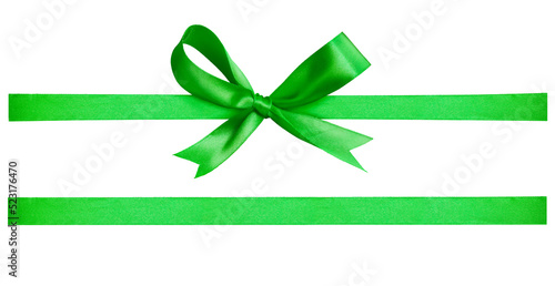 Obraz na płótnie A green ribbon and bow Christmas, birthday and valentines day present decoration set isolated against a transparent background w salonie