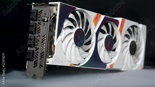 VGA Card, GPU, Graphic Card, Computer part with smoke rising and dark background photo