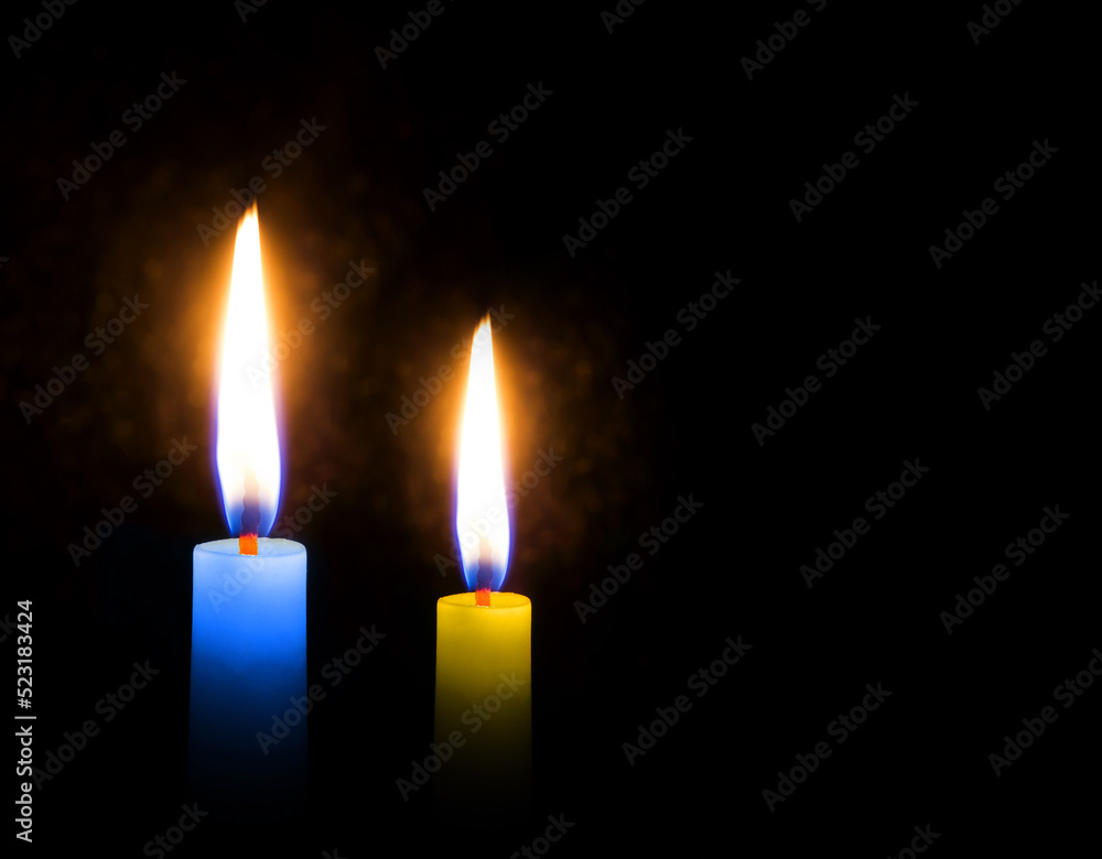 Candles on a black background. Sorrow and memory. Candles on a black background. Sorrow and memory.