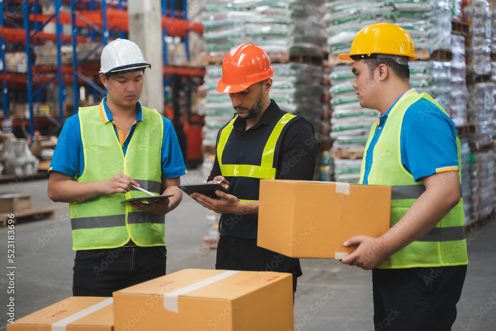 Manager using tablet Checke-Commerce Online Orders e-businessonline. In store Background Warehouse Retail Center with boxes global logistics network Products Delivery Infographics in Logistics Manager using tablet Checke-Commerce Online Orders e-businessonline. In store Background Warehouse Retail Center with boxes global logistics network Products Delivery Infographics in Logistics