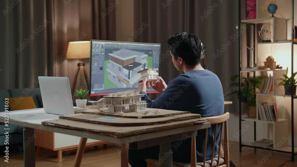 Asian Male Engineer Holding And Looking At The Small House Model With Solar Panel While Designing House On A Desktop At Home. Cyber Games House Design And Decoration
Asian Male Engineer Holding And Looking At The Small House Model With Solar Panel While Designing House On A Desktop At Home. Cyber Games House Design And Decoration