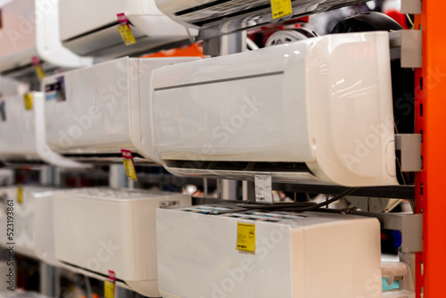 Assortment of air conditioners on the showcase of the electronic store