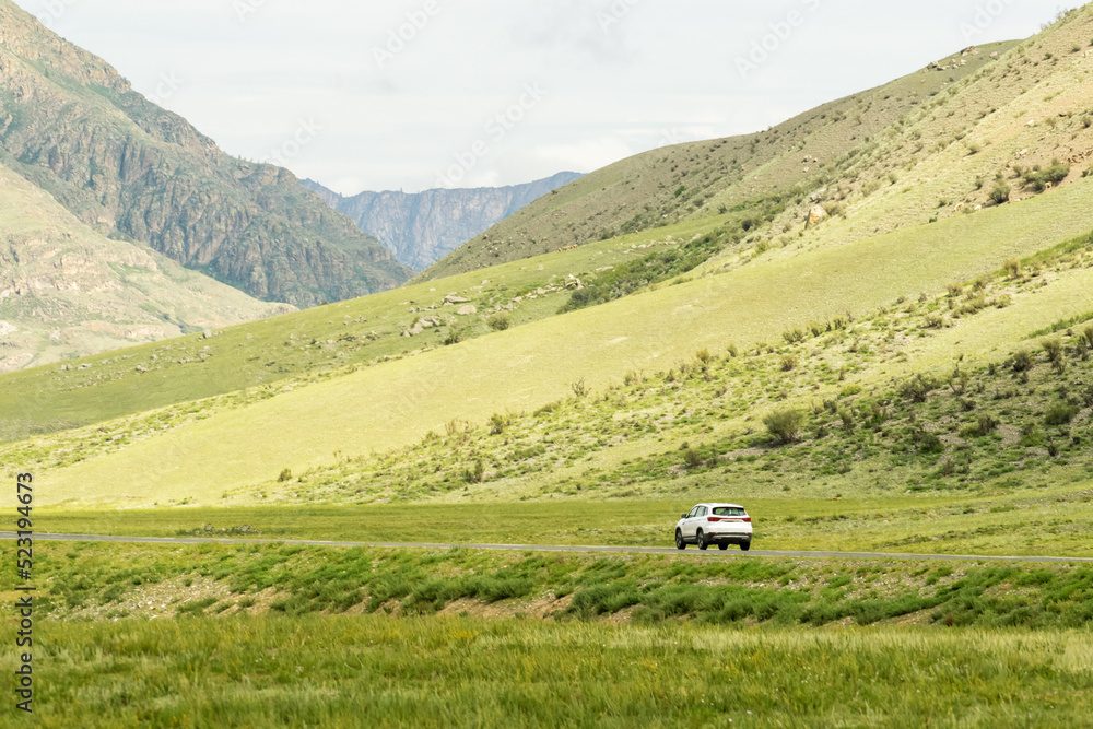 Travel by car through the wild. trip to the mountains by car. Concept auto travel with copy space.