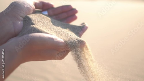 sand flowing from your hands