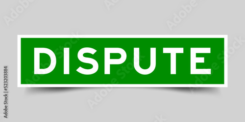 Sticker label with word dispute in green color on gray background