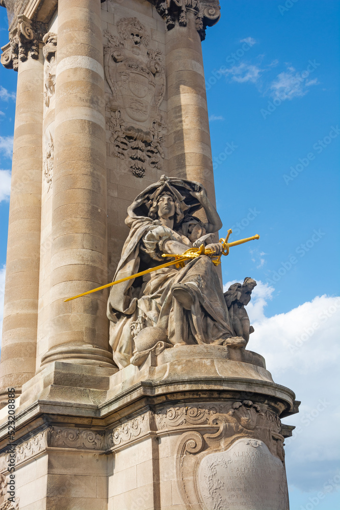 Fragment of a column with a sculpture of the Pont Alexandre III.