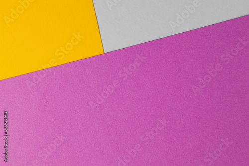 Purple, yellow and white colored paper texture background. Abstract background from craft paper