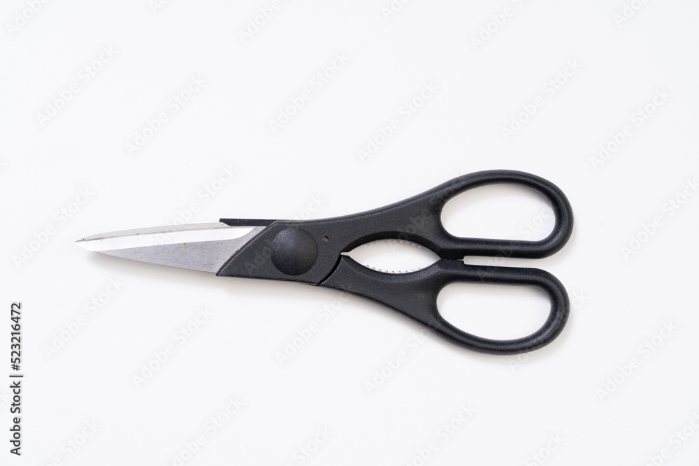 Black kitchen scissor on white background Black kitchen scissor on white background