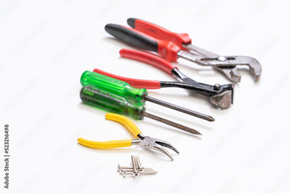 Set of hand tools on white background.