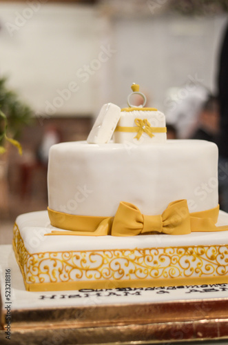 A wedding cake with the names of Hisham and Asmaa during 2018 photo