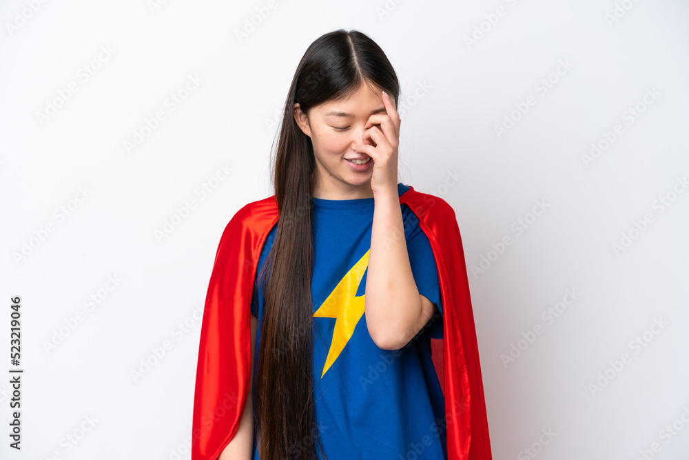 Super Hero Chinese woman isolated on white background laughing Super Hero Chinese woman isolated on white background laughing