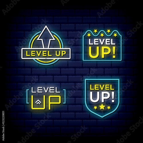 Level up neon signs style text Premium Vector set